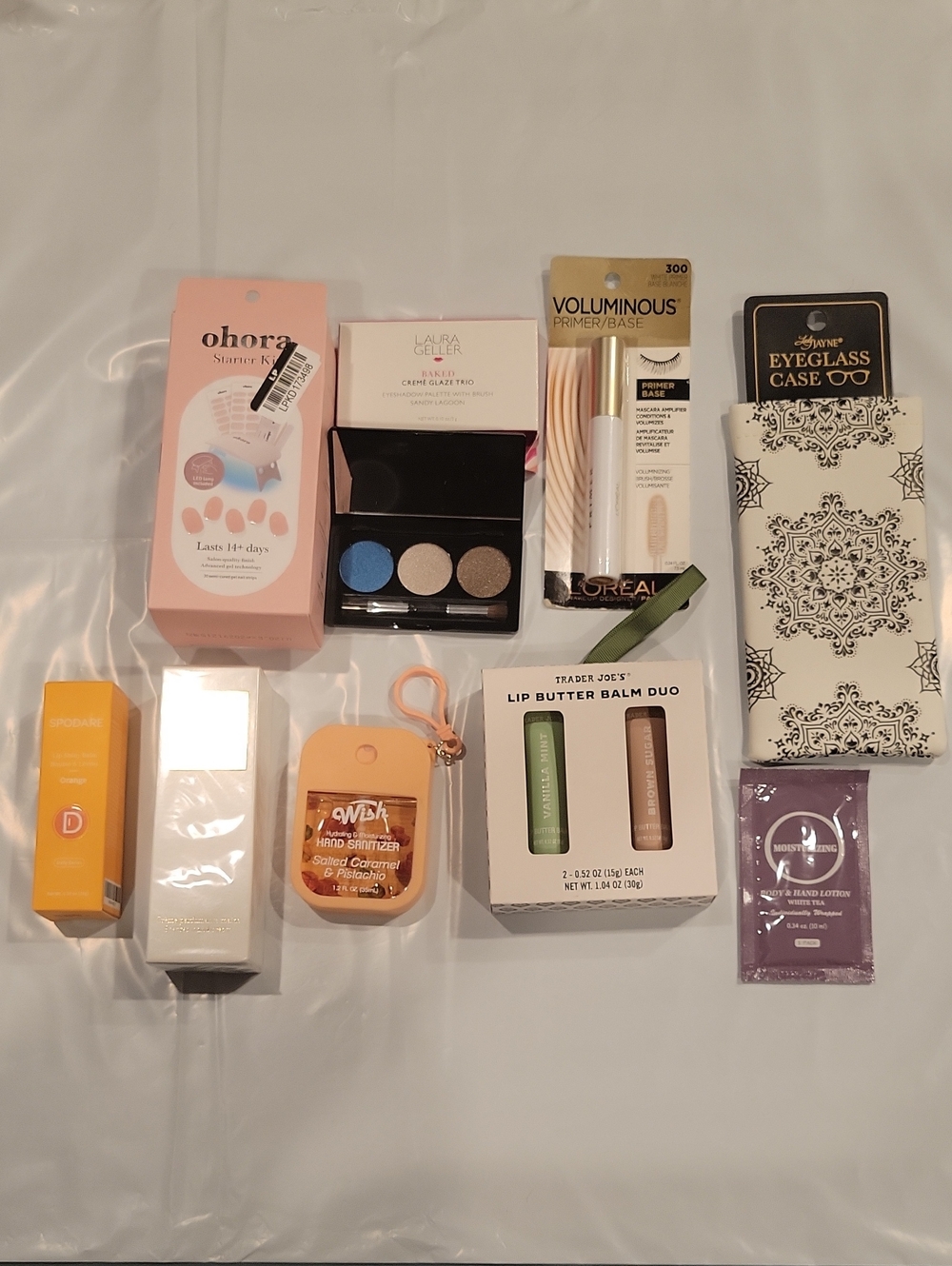 Assorted Beauty & Accessory Bundle - Blue & Gold Eyeshadow, White Patterned Case